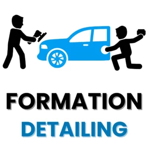 Techniciens en plein travail lors d'une formation detailing pro.