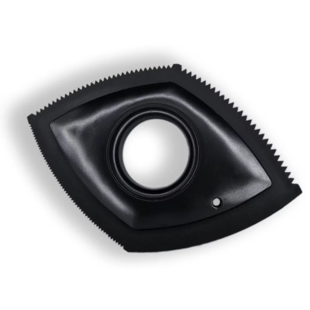 Brosse ergonomique noire en caoutchouc pour retirer les poils d'animaux.